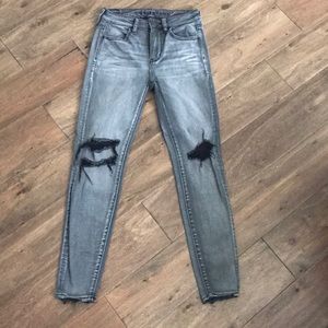 dark wash jeans with rips